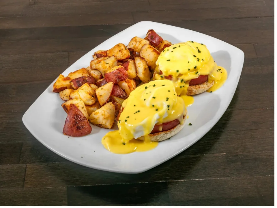 Eggs Benedict - Poached eggs on English muffin with hollandaise sauce