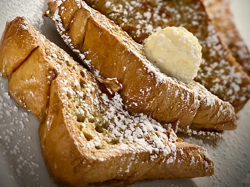 R12C French Toast - Thick-cut French toast with syrup and butter